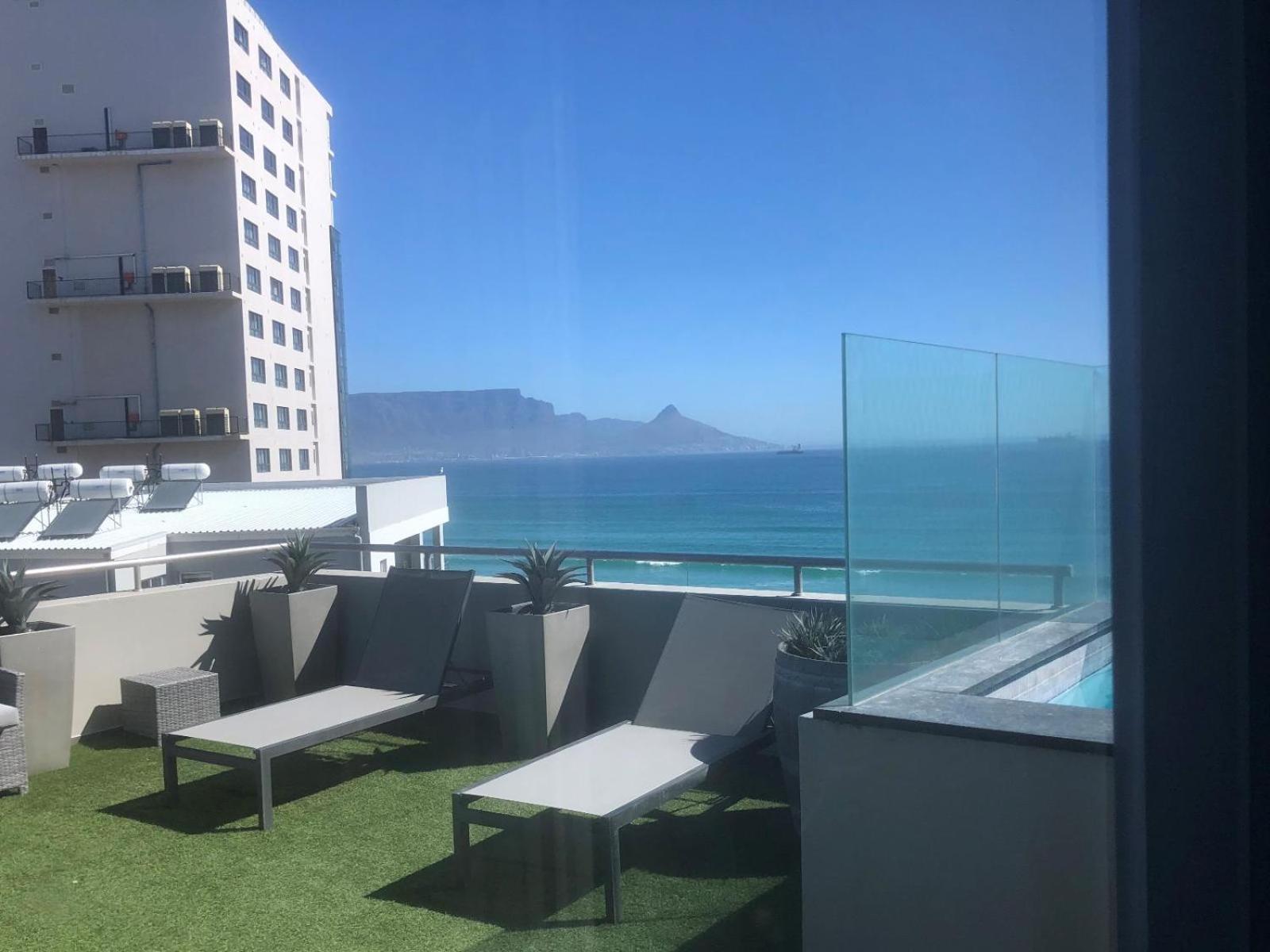 Infinity Self Catering Apartments Bloubergstrand Quarto foto